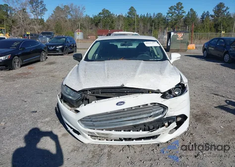 2013 Ford Fusion Hybrid Se z USA, uszkodzony, nr VIN 3FA6P0LUXDR373319